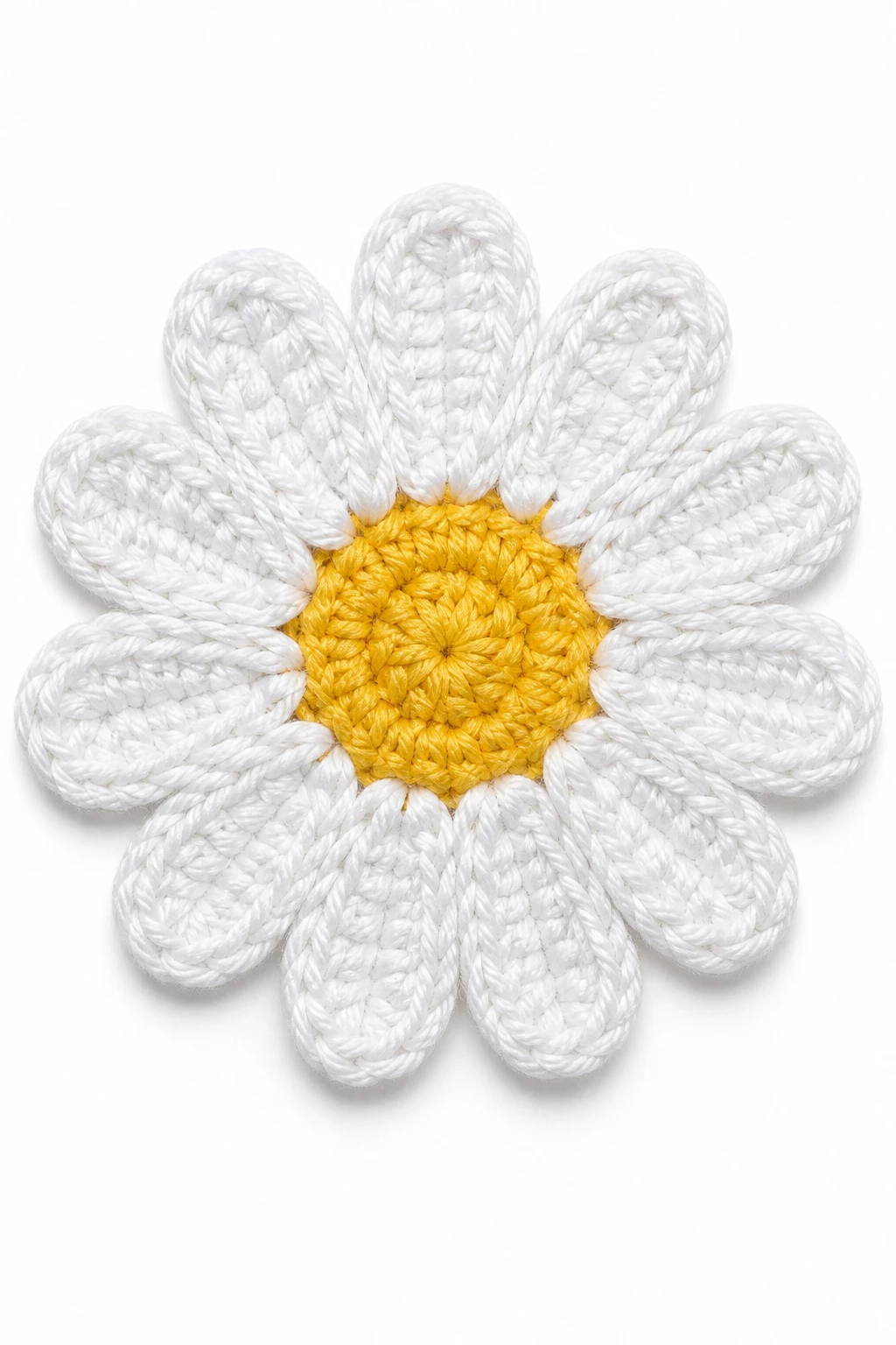 Studio closeup of a single daisy crochet piece with visible stitches on white background