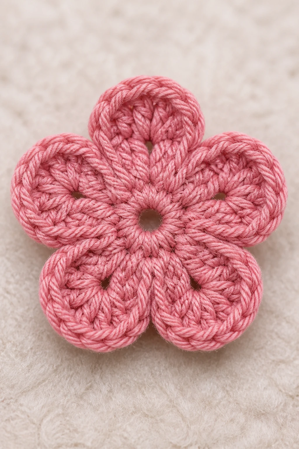 macro shot of a single crochet flower petals aligned perfectly
