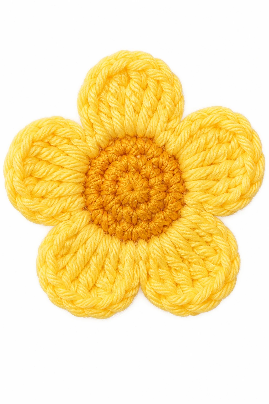 Closeup of a single crochet flower with yellow petals on a white background
