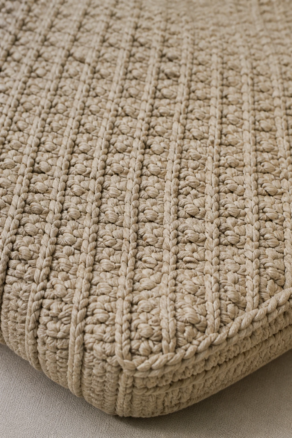 closeup of sturdy stitch pattern on tote bottom with grid weave