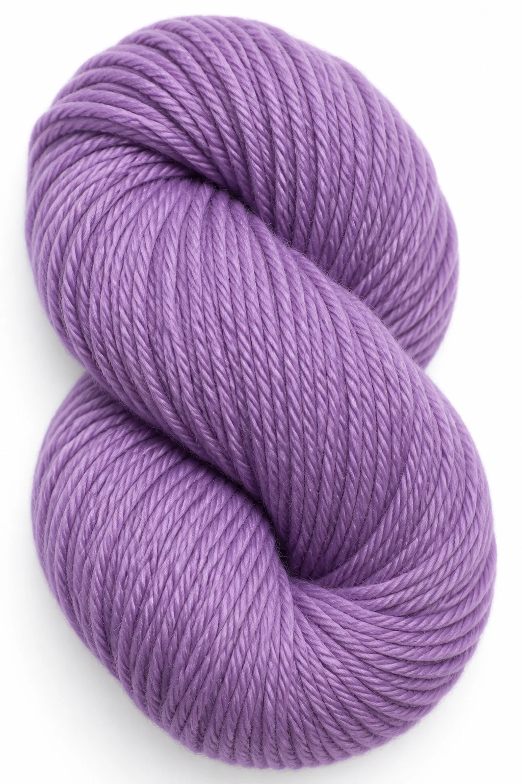 Closeup of a smooth, medium-weight yarn skein on a plain white background