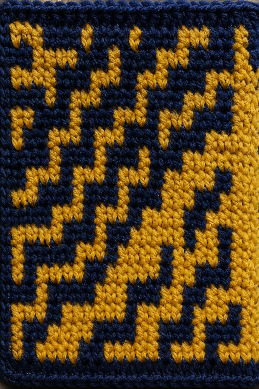 Closeup of a single mosaic crochet swatch with bold color change