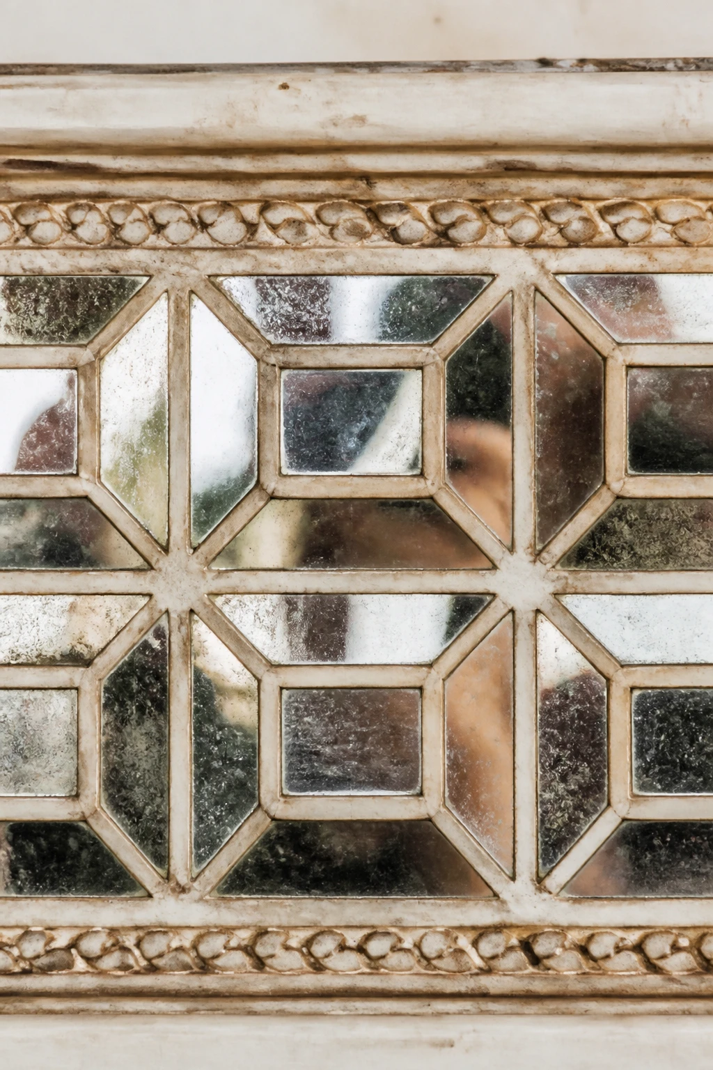 Closeup shot of mirrored square motifs forming a border, nostalgic texture